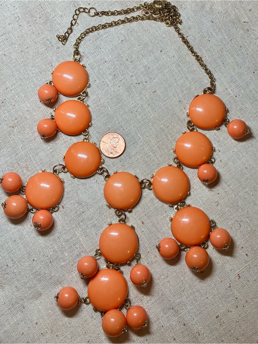 Gold-Tone Coral Orange Statement Bib Necklace is 27” long